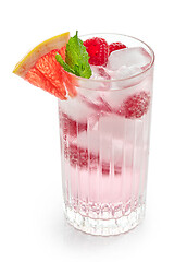 Image showing glass of iced drink with fresh raspberries