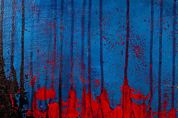 Image showing Blue, red and black colored wall texture background. 