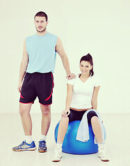 Image showing happy young couple fitness workout and fun