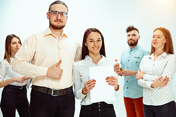 Image showing Boss approving and congratulating young successful employee