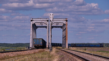 Image showing Twin railway bridge against blue sky