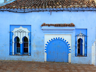 Image showing house wall on blue street Chefchaouen
