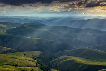 Image showing Sunbeams on hills in Caucasus mountains