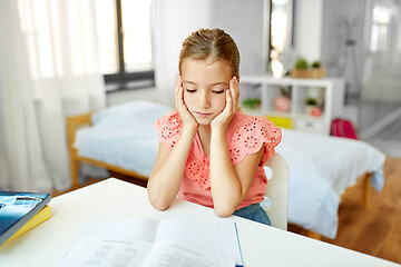 Image showing sad student girl with notebook at home
