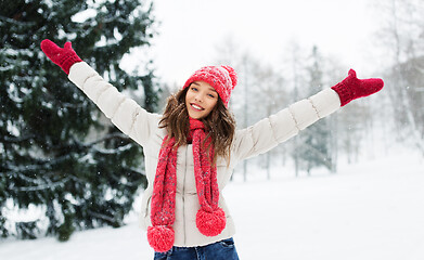 Image showing happy young woman in winter park