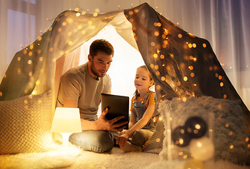 Image showing family with tablet pc in kids tent at home