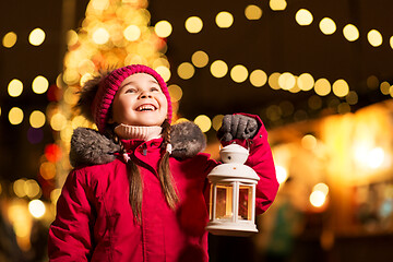 Image showing happy little girl at christmas with lantern market