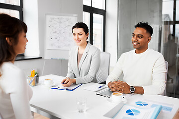 Image showing recruiters having job interview with employee