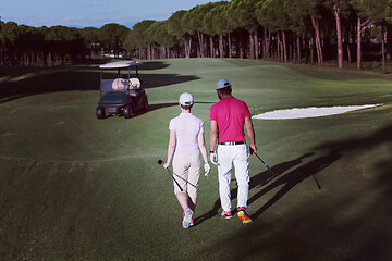 Image showing couple walking on golf course