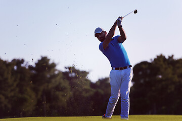 Image showing golfer hitting long shot