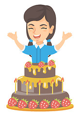 Image showing Little caucasian girl jumping out of a large cake.