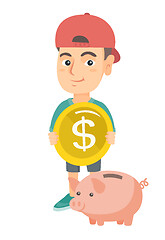 Image showing Caucasian boy putting a coin into a piggy bank.