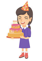 Image showing Caucasian child holding birthday cake with candles