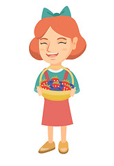 Image showing Girl with the basket of strawberry and blueberry.