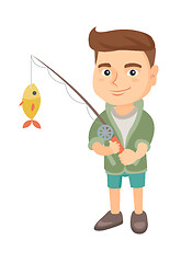 Image showing Little boy holding fishing rod with fish on hook.