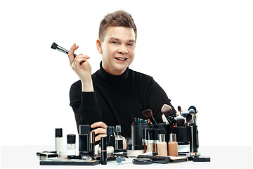 Image showing Professional makeup artist isolated on white