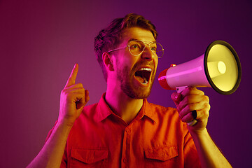 Image showing man making announcement with megaphone