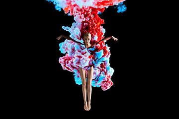 Image showing Modern art collage. Concept ballerina\'s legs with colorful smoke.