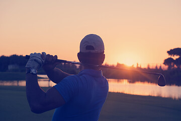 Image showing golfer hitting long shot