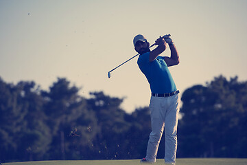 Image showing golfer hitting long shot