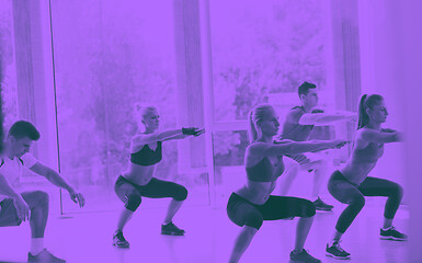 Image showing Group of people exercising at the gym