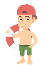 Image showing Little caucasian boy holding a red-white lifebuoy.