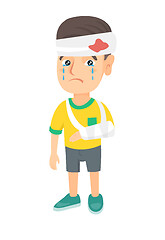 Image showing Caucasian boy with broken arm and bandaged head.