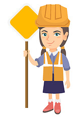 Image showing Little caucasian builder girl holding road sign.