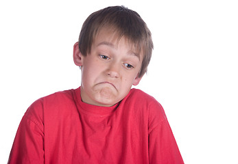 Image showing unsure boy on white