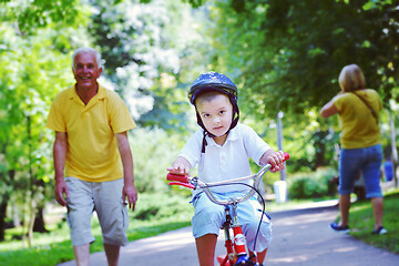 Image showing happy grandfather and child in park