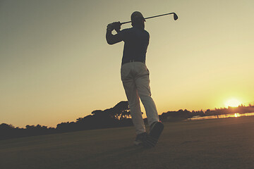 Image showing golfer hitting long shot