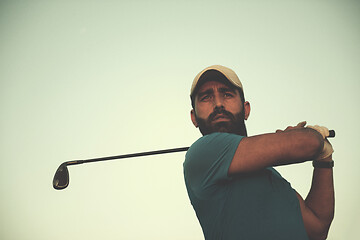 Image showing golfer hitting long shot