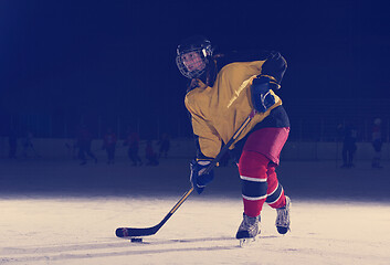 Image showing teen ice hockey player in action