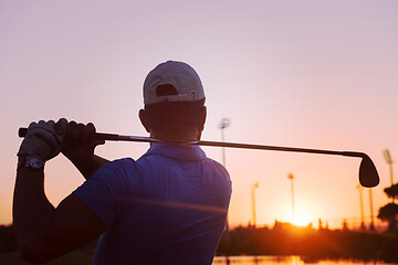 Image showing golfer hitting long shot