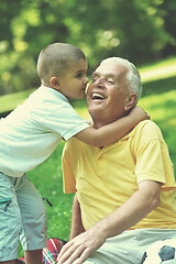 Image showing happy grandfather and child in park