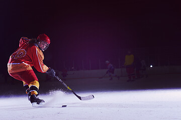 Image showing teen ice hockey player in action