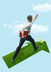 Image showing Businessman holding laptop walking on graphic stair, start up business concepts.