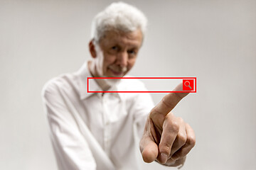 Image showing Businessman hand touching empty virtual screen