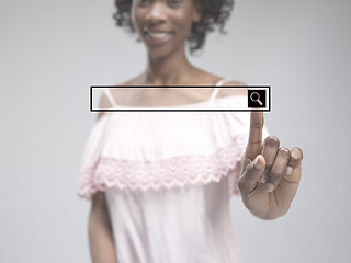 Image showing Woman\'s hand with finger on blue background