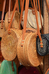 Image showing Balinese handmade rattan eco bags in a local souvenir market