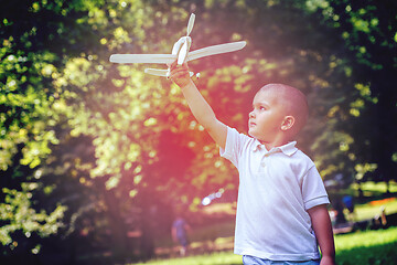 Image showing boy with airpane toy