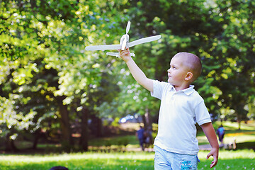 Image showing boy with airpane