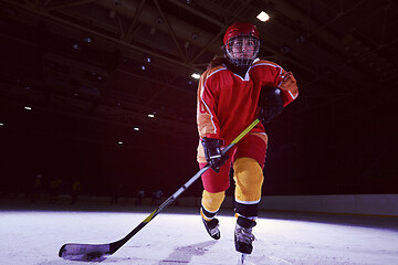 Image showing teen ice hockey player in action