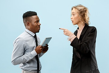 Image showing Serious businesswoman and colleague in the office.