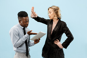 Image showing Serious businesswoman and colleague in the office.