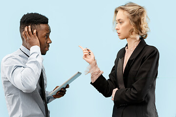 Image showing Serious businesswoman and colleague in the office.