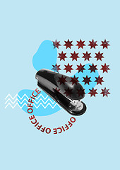 Image showing Office concept. Black stapler on blue background