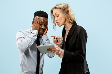 Image showing Serious businesswoman and colleague in the office.