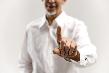 Image showing Businessman hand touching empty virtual screen