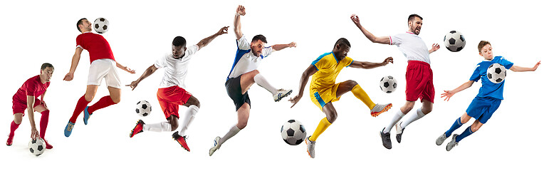 Image showing Professional men - football soccer players with ball isolated white studio background